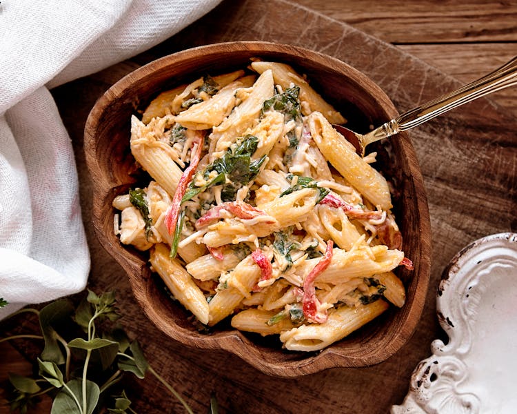 Creamy penne pasta with roasted vegetables